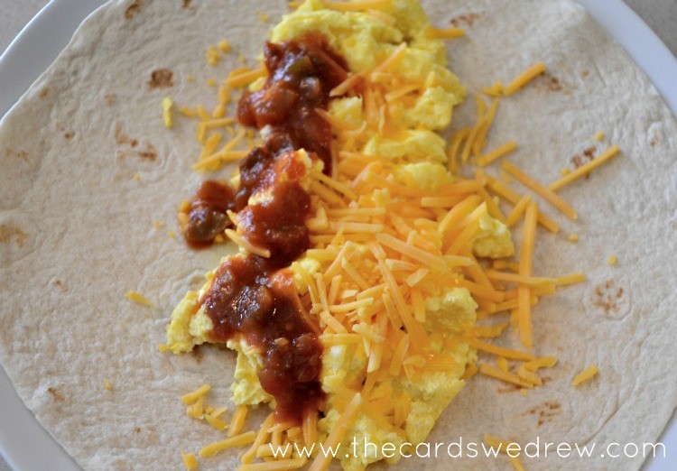 breakfast burrito with salsa and cheese
