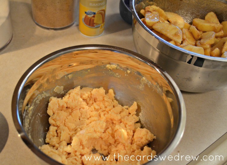 mix together butter and cake mix to create the strudel on top