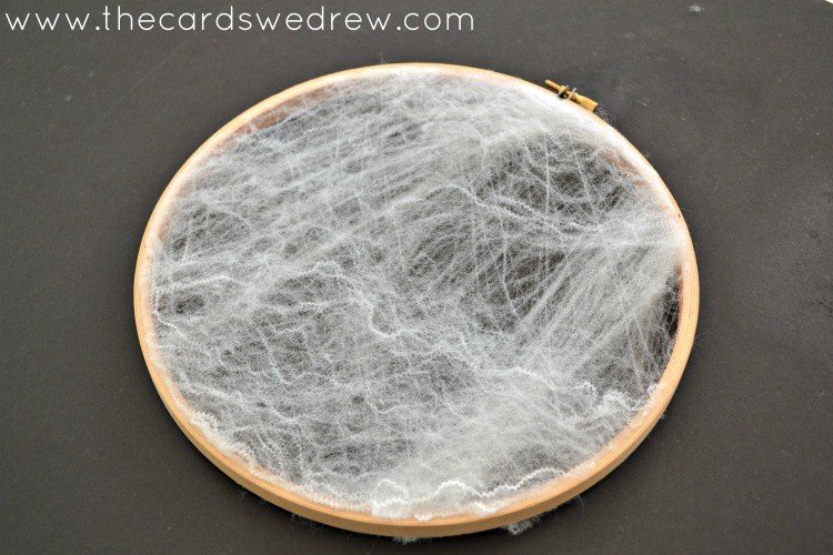 trim the excess web off the hoop