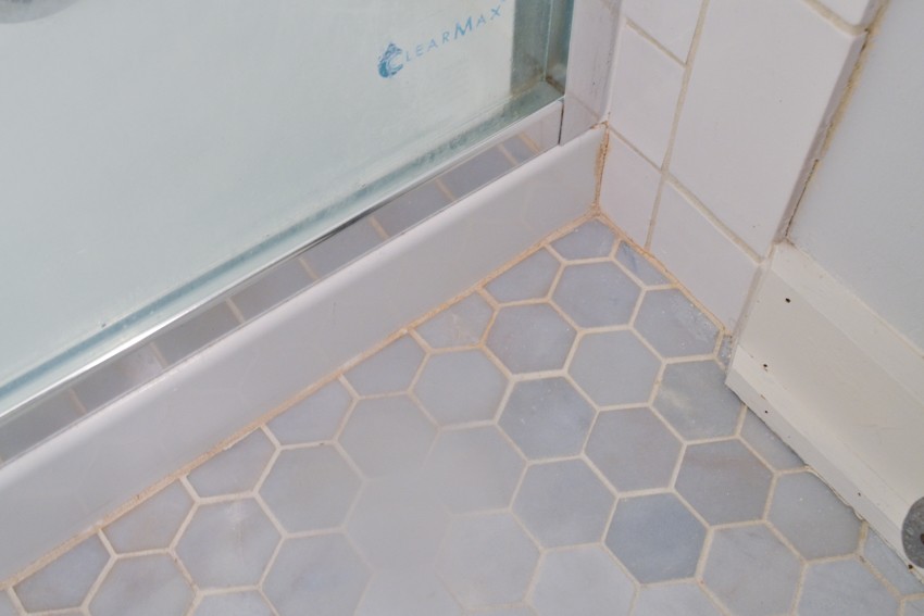 orange stains in bathroom tile